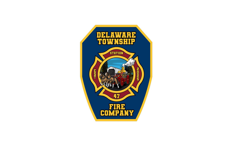A blue and gold badge for Delaware Township Fire Company Station 47, featuring an old-fashioned fire engine and horses at the center, surrounded by fire service symbols.