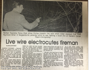 Newspaper clipping shows a police chief inspecting a live wire with a stick at night. Headline reads, “Live wire electrocutes fireman.” The article reports the death of a firefighter while battling a brush fire.